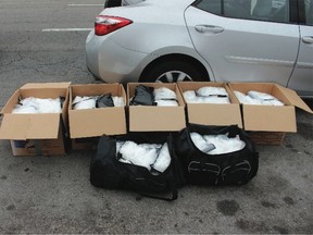 Packages of meth outside a car.